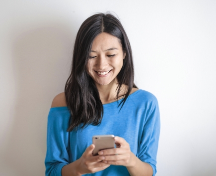 happy woman with phone