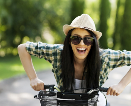 happy girl on bicycle