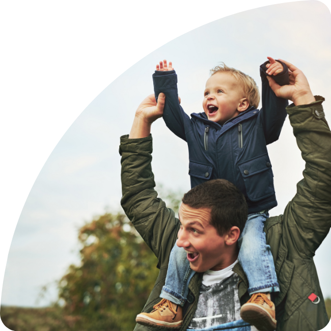 Son on father's shoulders