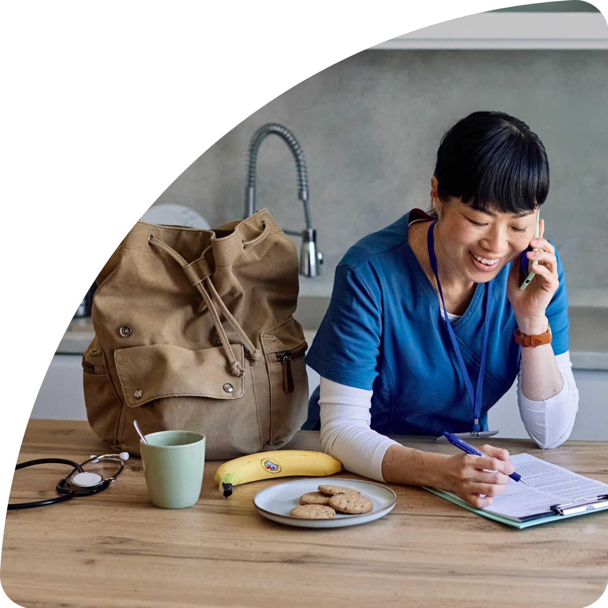 Nurse at home in her kitchen