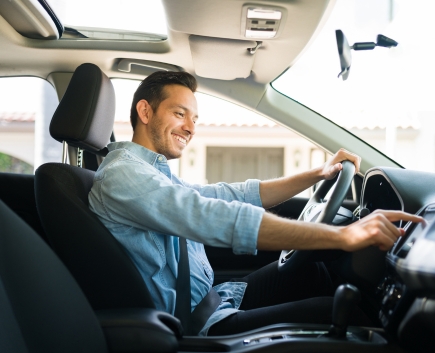 happy man in new car