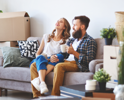 happy couple on couch
