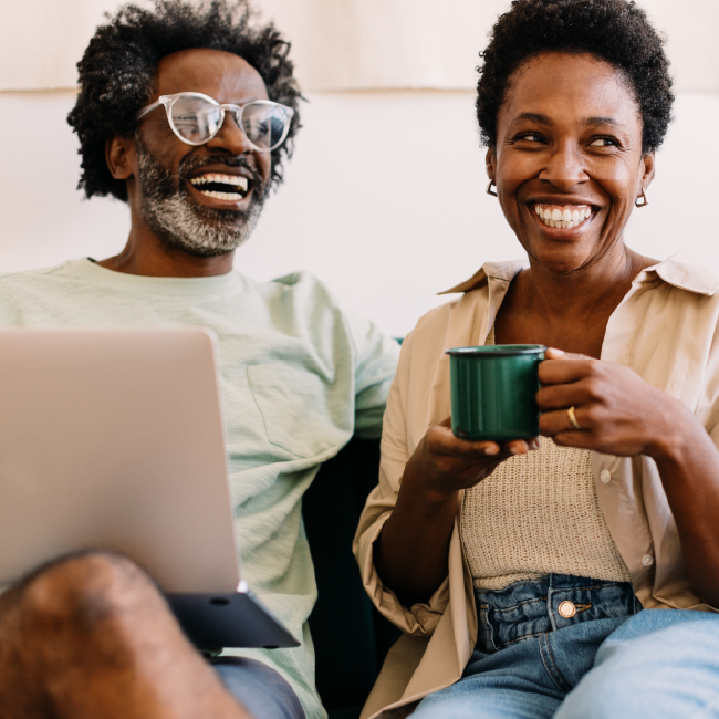 happy couple on couch